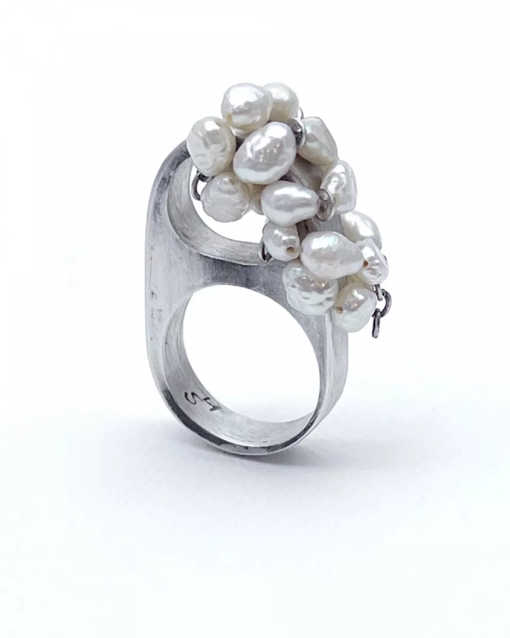 handmade sterling silver ring one of a kind , freshwater pearls with hollow ring design