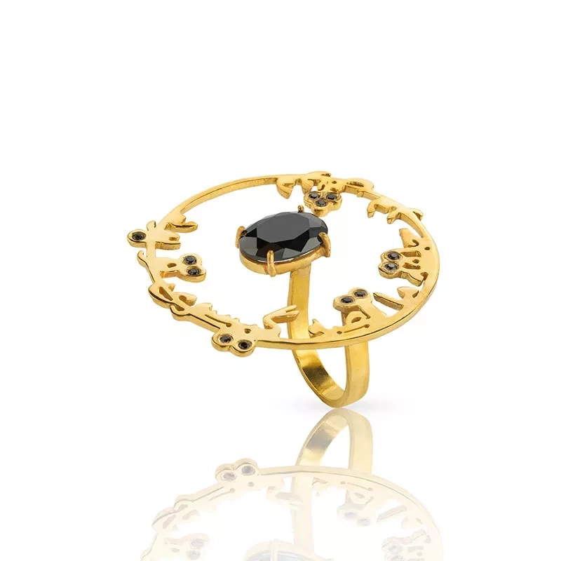 Gold-plated silver calligraphy ring with black oval crystal in the middle