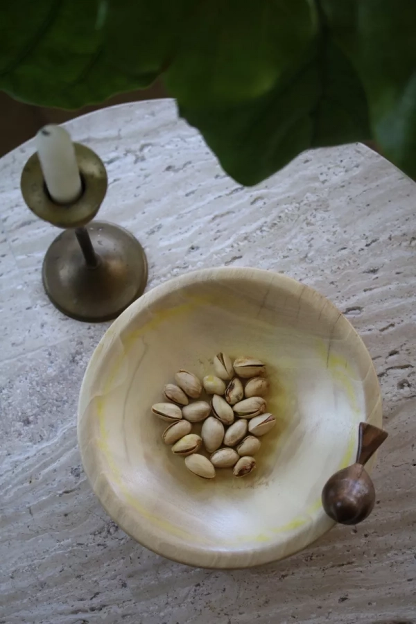 Wooden bowl with hand carved bird