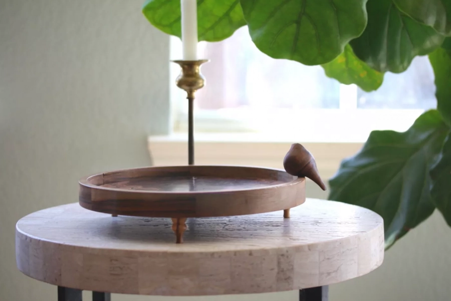Wooden round wood tray with hand carved bird