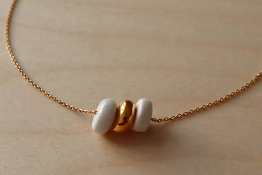 Necklace with three porcelain pendants