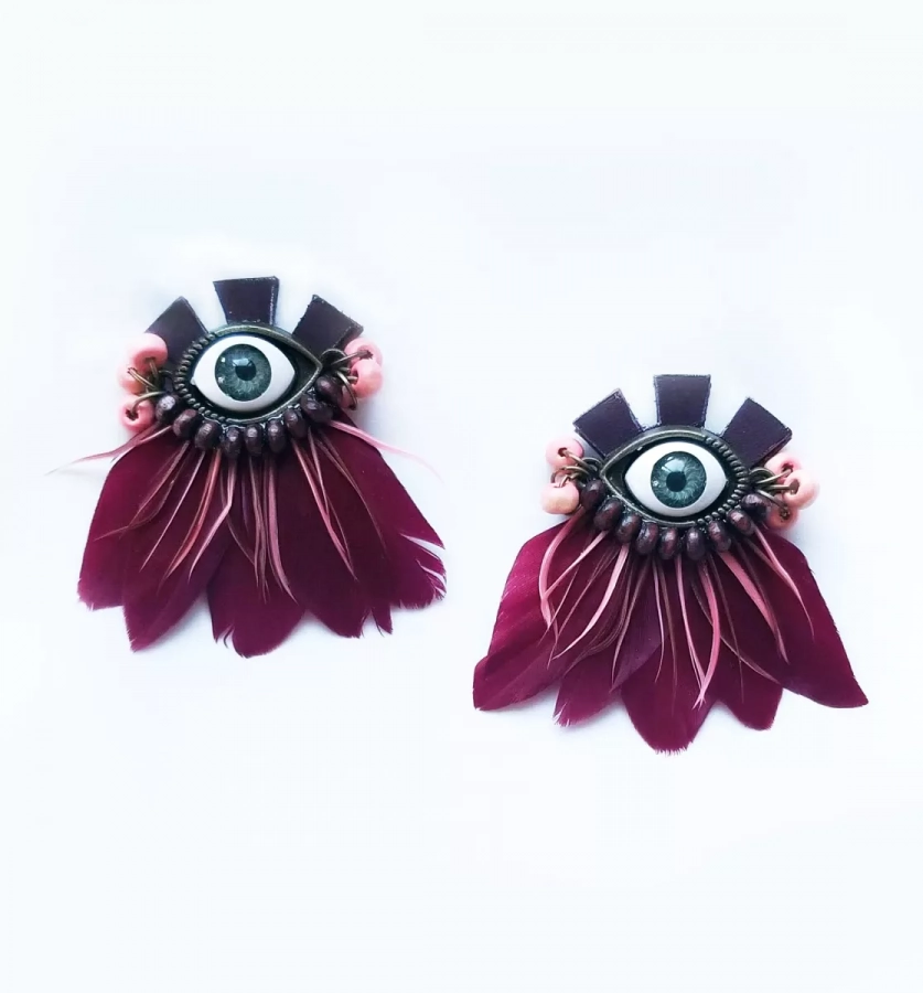 Evil eye earrings with red feathers