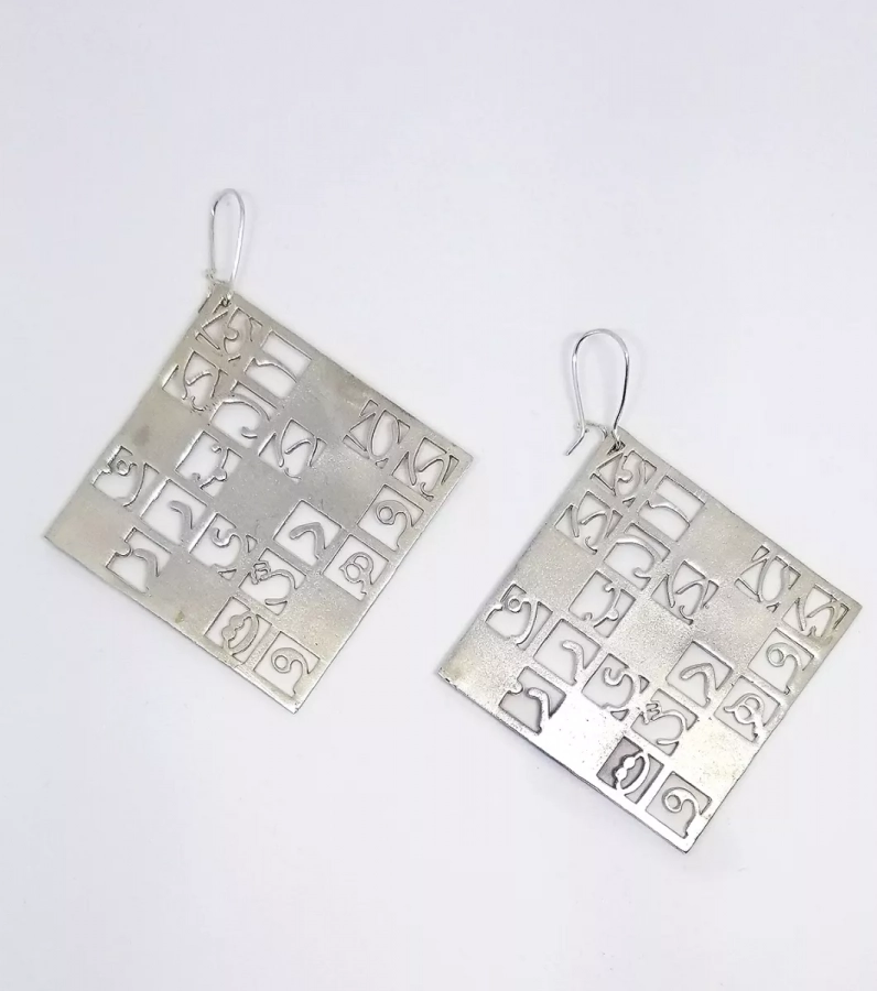 Nostalgic Silver earrings inspired by Iranian crossword puzzle